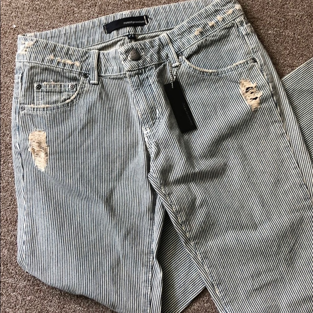 Striped distressed jeans